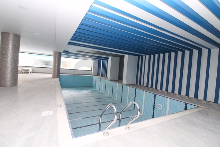 Квартира 1+1 на первой линии в Махмутлар