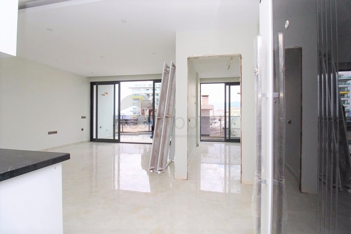 Квартира 1+1 на первой линии в Махмутлар