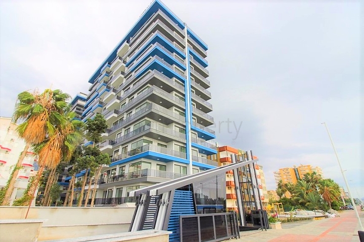 Квартира 1+1 на первой линии в Махмутлар