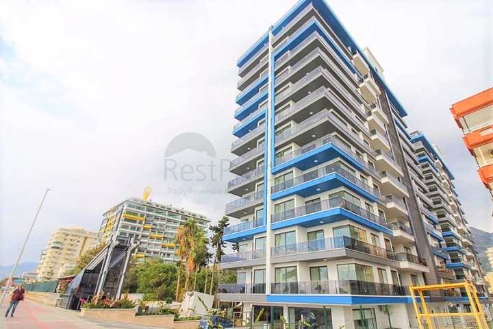 Квартира 1+1 на первой линии в Махмутлар