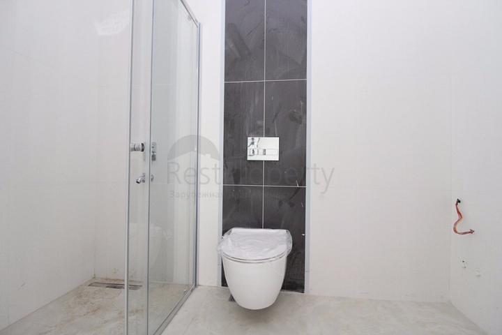 Квартира 1+1 на первой линии в Махмутлар