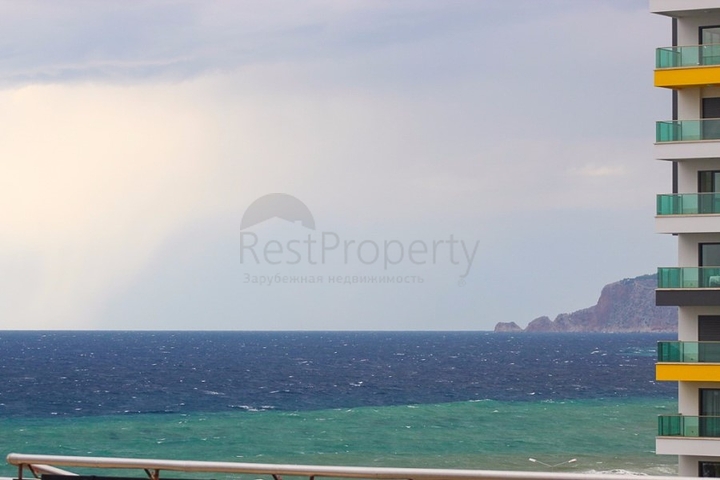 Квартира 1+1 на первой линии в Махмутлар