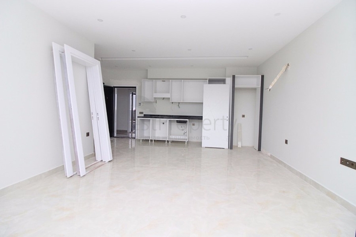 Квартира 1+1 на первой линии в Махмутлар