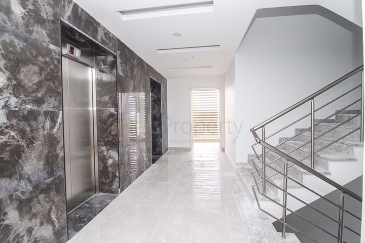 Квартира 1+1 на первой линии в Махмутлар