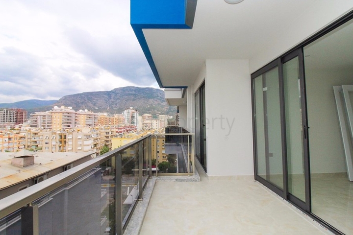 Квартира 1+1 на первой линии в Махмутлар