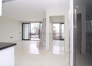 Квартира 1+1 на первой линии в Махмутлар