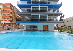 Квартира 1+1 на первой линии в Махмутлар