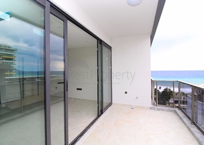 Квартира 1+1 на первой линии в Махмутлар