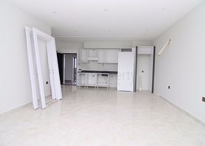 Квартира 1+1 на первой линии в Махмутлар