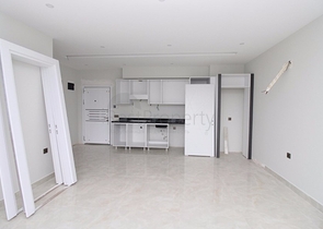 Квартира 1+1 на первой линии в Махмутлар