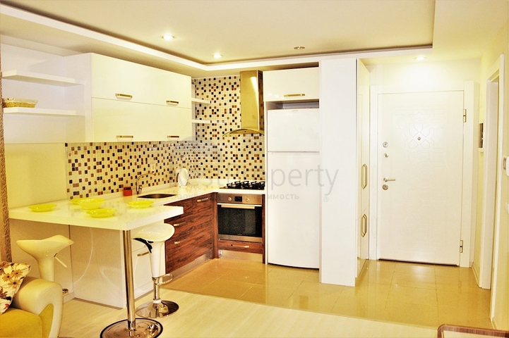 Квартира 1+1 с мебелью в Лимане Коньяалты 350 м до моря