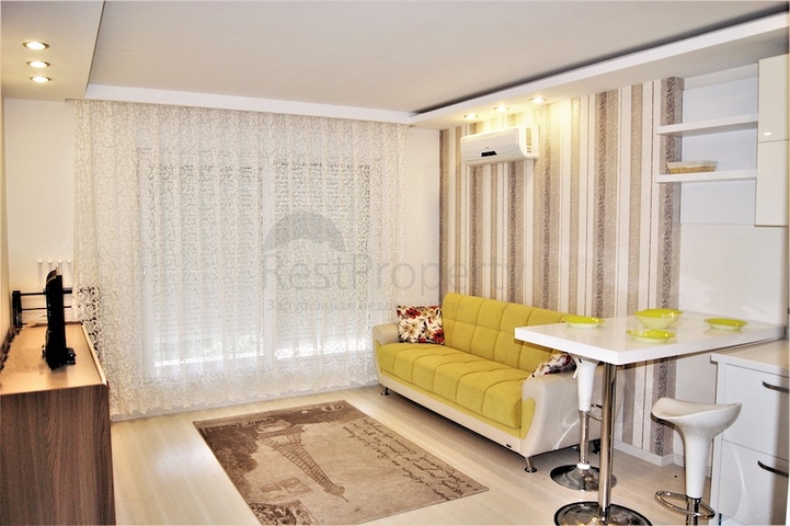 Квартира 1+1 с мебелью в Лимане Коньяалты 350 м до моря