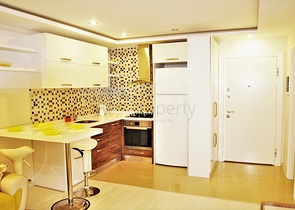 Квартира 1+1 с мебелью в Лимане Коньяалты 350 м до моря