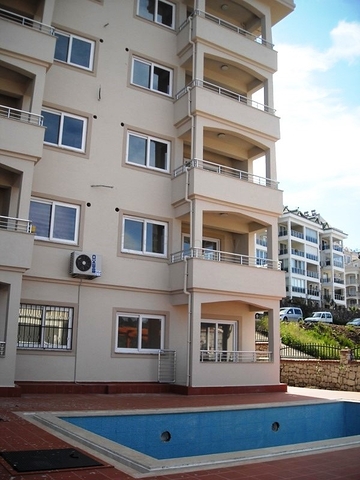 Новые апартаменты на продажу с 2-мя спальнями в центре Фетхие/Ташьяка