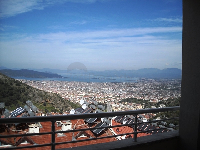 Новые апартаменты на продажу с 2-мя спальнями в центре Фетхие/Ташьяка