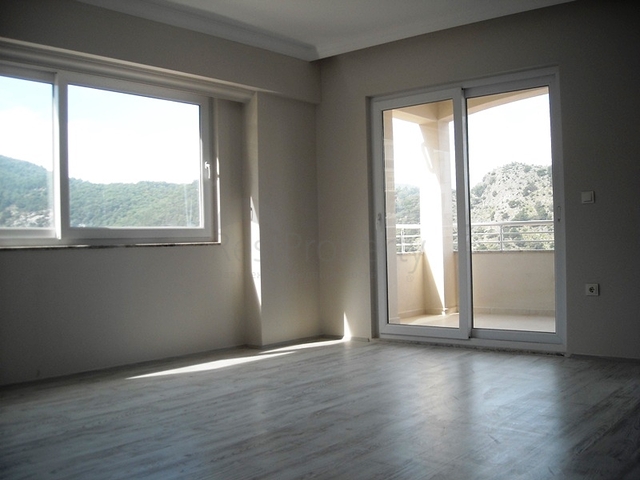 Новые апартаменты на продажу с 2-мя спальнями в центре Фетхие/Ташьяка