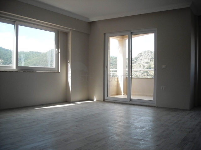 Новые апартаменты на продажу с 2-мя спальнями в центре Фетхие/Ташьяка