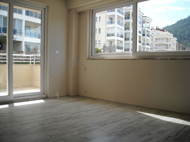 Новые апартаменты на продажу с 2-мя спальнями в центре Фетхие/Ташьяка