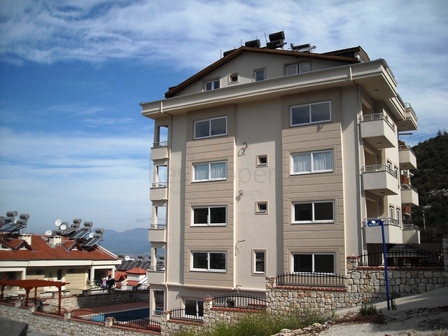 Новые апартаменты на продажу с 2-мя спальнями в центре Фетхие/Ташьяка