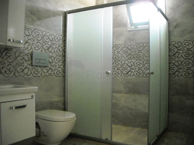 Новые апартаменты на продажу с 2-мя спальнями в центре Фетхие/Ташьяка