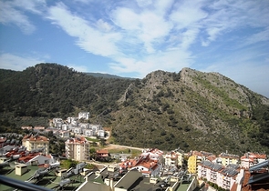 Новые апартаменты на продажу с 2-мя спальнями в центре Фетхие/Ташьяка