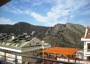 Новые апартаменты на продажу с 2-мя спальнями в центре Фетхие/Ташьяка