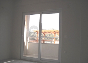 Новые апартаменты на продажу с 2-мя спальнями в центре Фетхие/Ташьяка