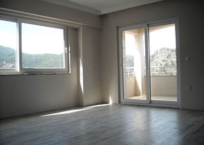 Новые апартаменты на продажу с 2-мя спальнями в центре Фетхие/Ташьяка