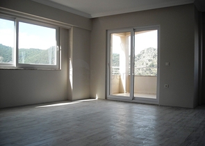 Новые апартаменты на продажу с 2-мя спальнями в центре Фетхие/Ташьяка