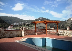 Новые апартаменты на продажу с 2-мя спальнями в центре Фетхие/Ташьяка