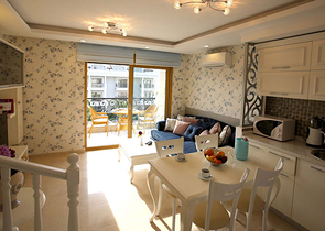 Новый жилой комплекс в живописной долине среди хвойного леса с видом на горы