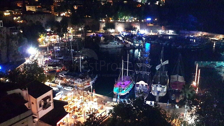 Земля с проектом отеля в Калеичи в Анталии