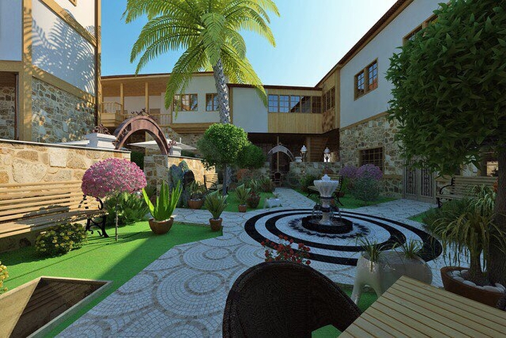 Земля с проектом отеля в Калеичи в Анталии