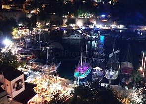 Земля с проектом отеля в Калеичи в Анталии