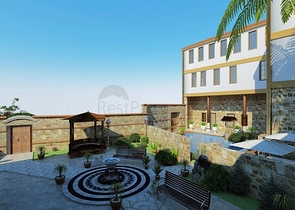 Земля с проектом отеля в Калеичи в Анталии