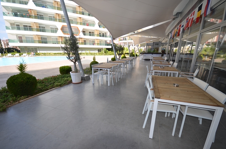 Квартира-студия в аренду в благоустроенном комплексе в Авсалларе