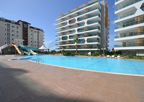 Квартира-студия в аренду в благоустроенном комплексе в Авсалларе