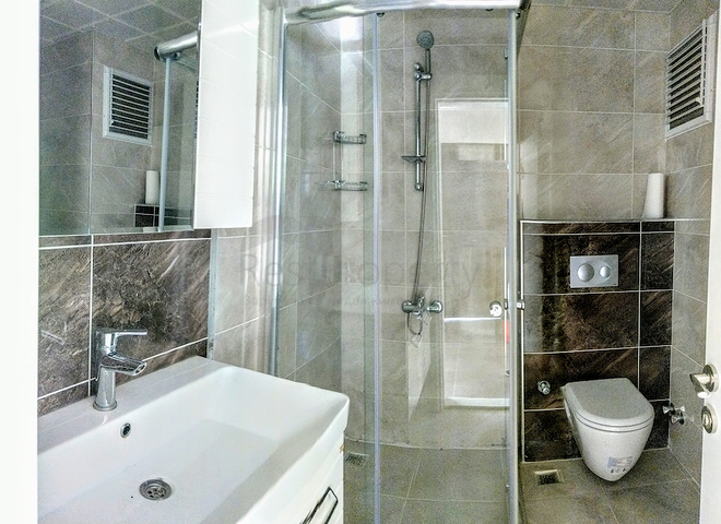 Квартира 1+1 с газовым отоплением в Коньяалты Анталья