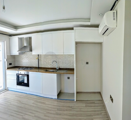 Квартира 1+1 с газовым отоплением в Коньяалты Анталья