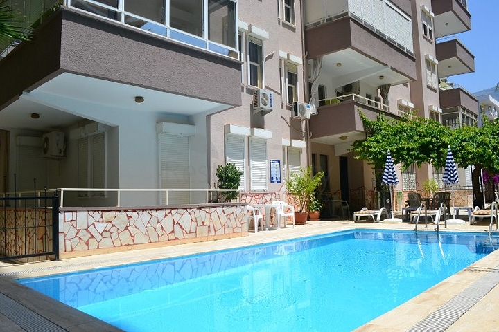 Меблированные апартаменты 1+1 в Махмутларе