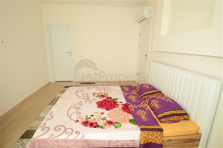 Светлые апартаменты 2+1 в Махмутларе 