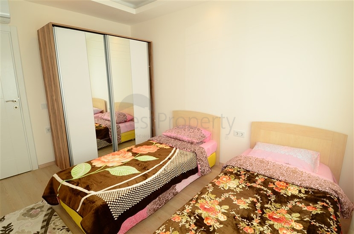 Светлые апартаменты 2+1 в Махмутларе 