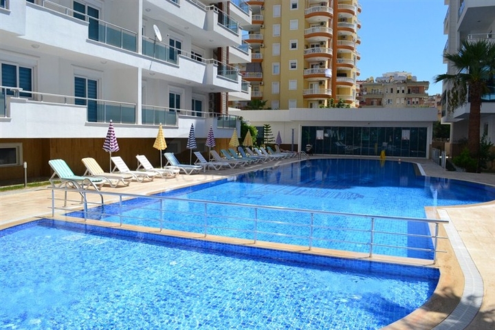 Светлые апартаменты 2+1 в Махмутларе 