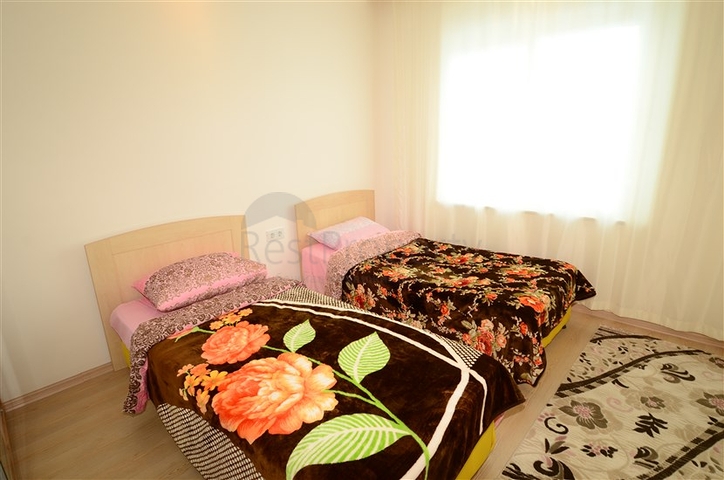 Светлые апартаменты 2+1 в Махмутларе 