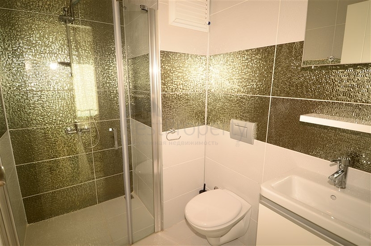 Светлые апартаменты 2+1 в Махмутларе 