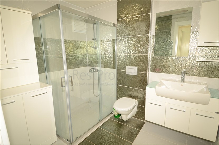 Светлые апартаменты 2+1 в Махмутларе 