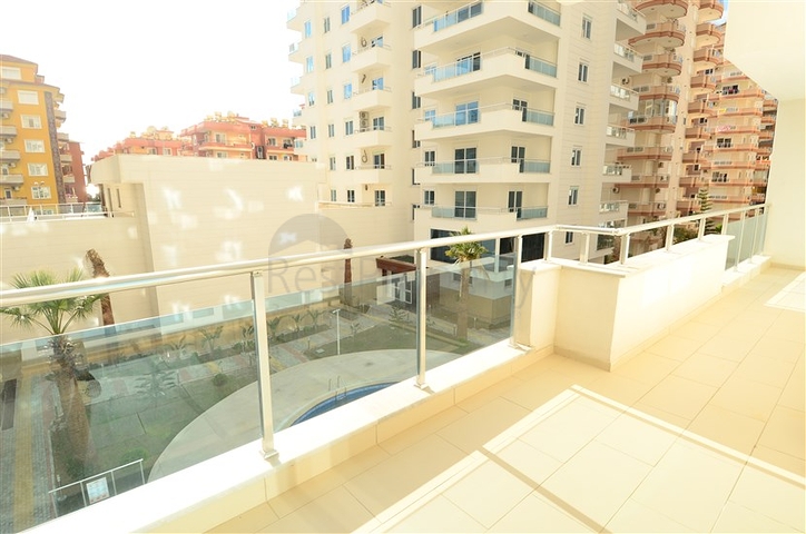 Светлые апартаменты 2+1 в Махмутларе 