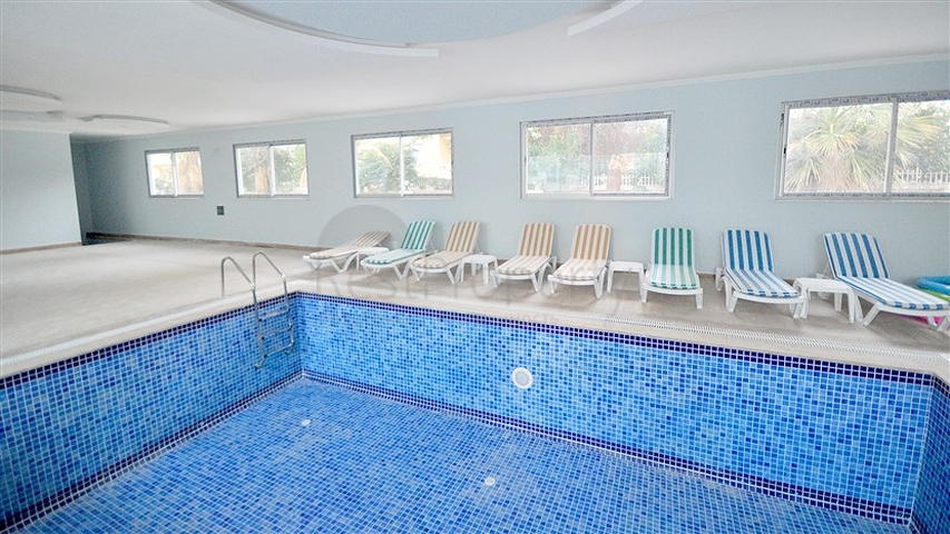 Светлые апартаменты 2+1 в Махмутларе 