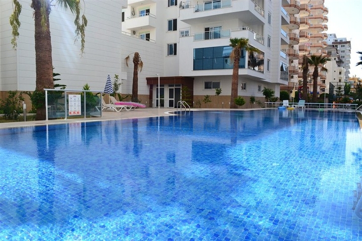 Светлые апартаменты 2+1 в Махмутларе 