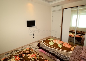 Светлые апартаменты 2+1 в Махмутларе 